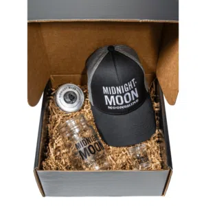 Midnight Moon gift box with moonshine barware, hat, mason jar and more.