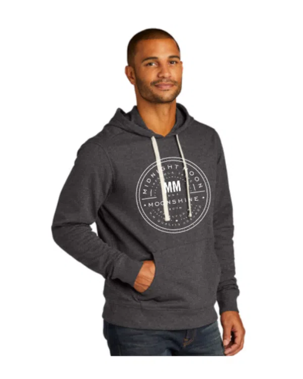 Man wearing Midnight Moon fleece hoodie with logo